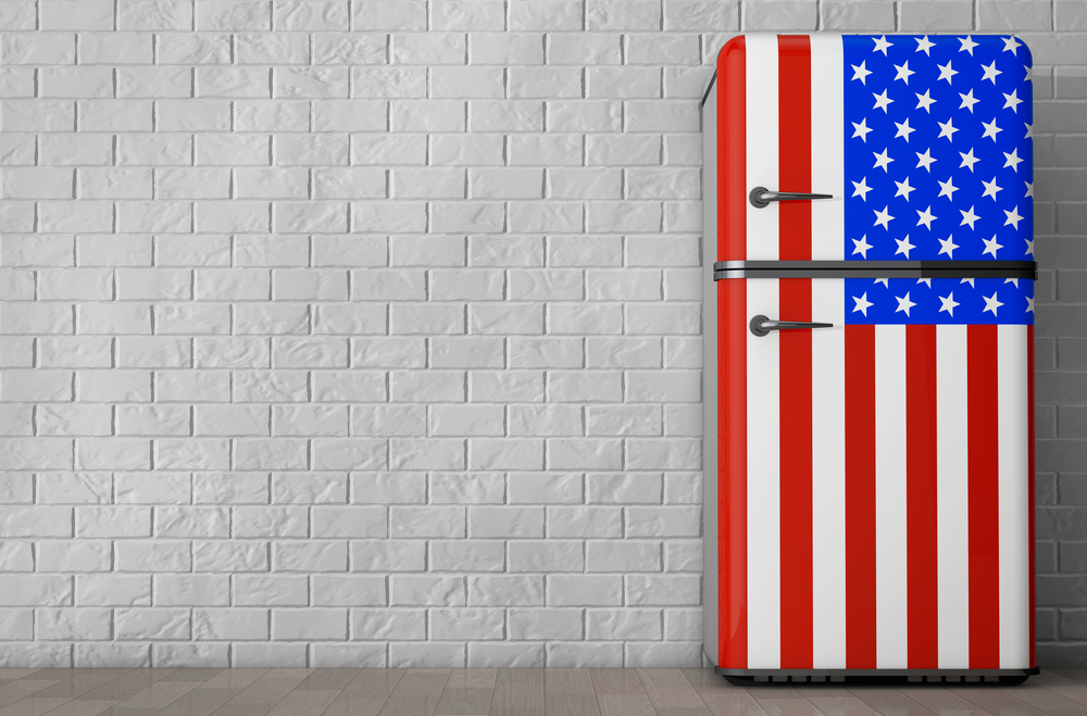 Retro refrigerator with the USA flag in front of Brick Wall. 3d Rendering