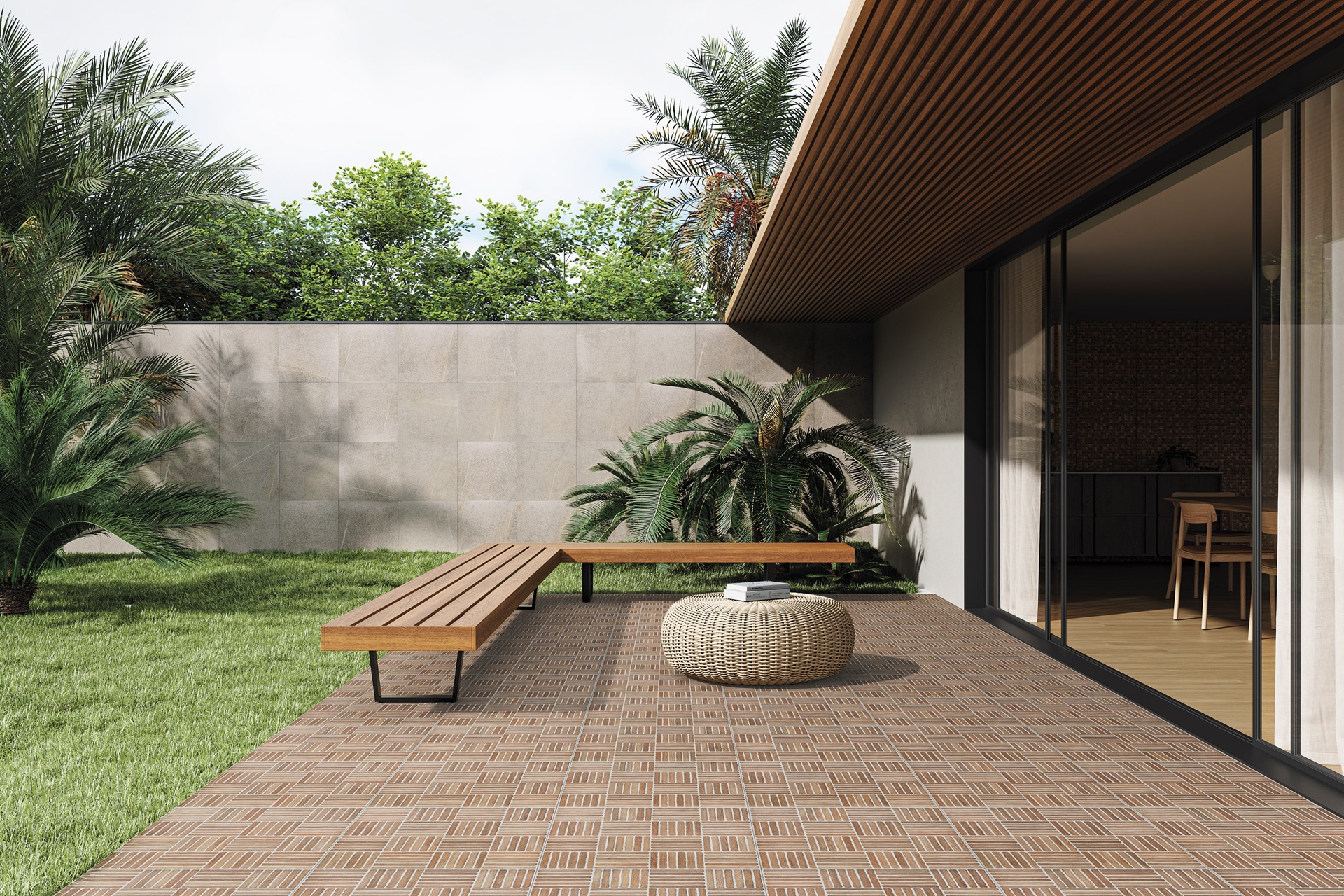área externa com piso frio que mimita madeira e jardim